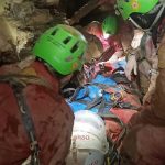 Rescuers work their way up to being a cave explorer