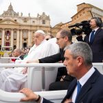 A weakened Pope - cheered by the believers